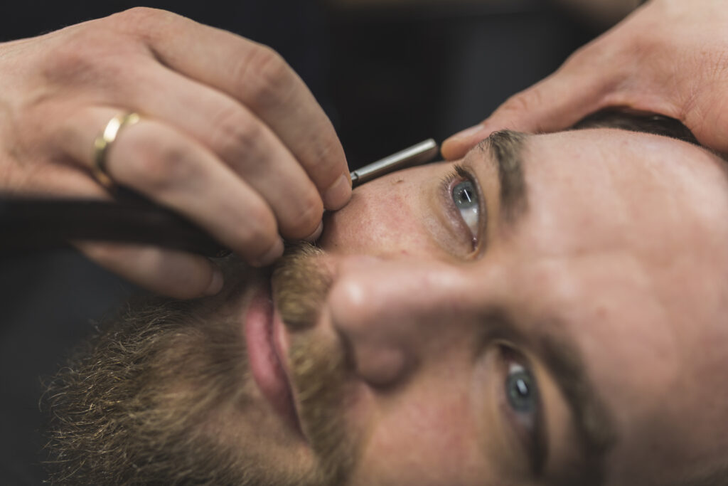 from-hands-shaving-man